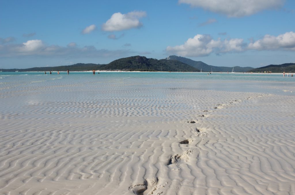 Footprints in the sand in the Whitsunday Islands, Australia