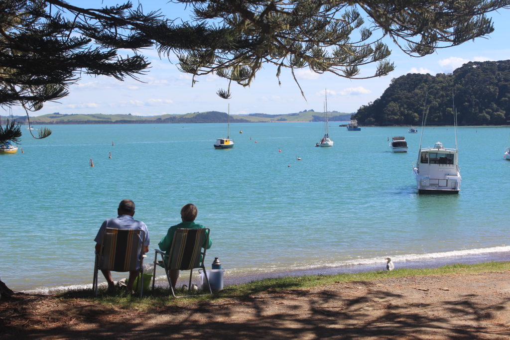 A couple relax in Russell in the Bay of Islands, New Zealand