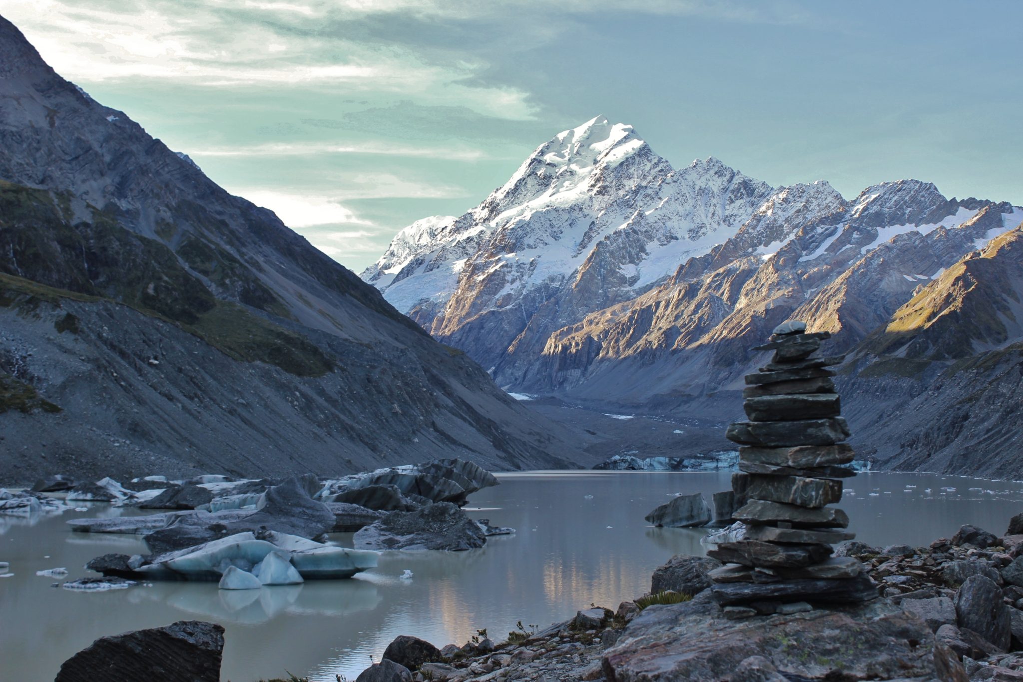 The Hooker Glacier terminal lake, one of the best things to see during your one day in Aoraki/Mount Cook, New Zealand, and one of my favourite hikes in the world