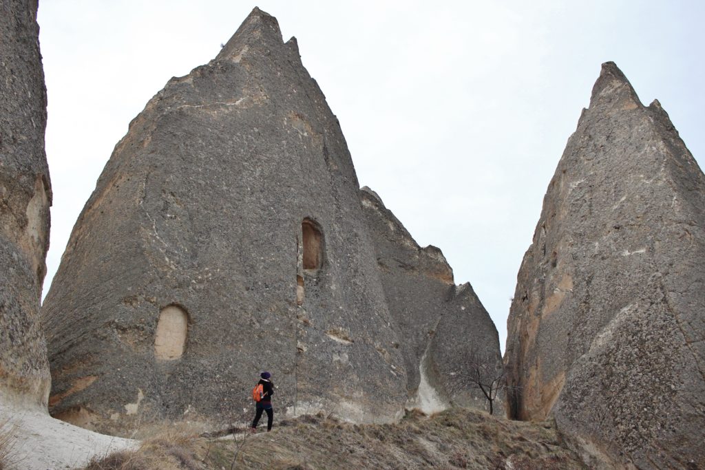 Walking past wide fairy chimneys in Cappadocia, Turkey