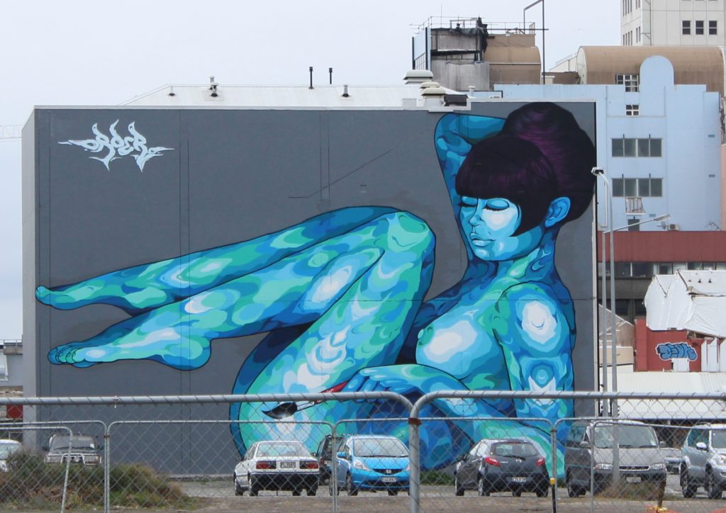 A large mural of a woman in Christchurch, New Zealand
