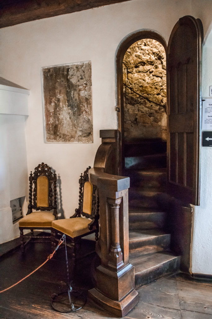 The entrance to a secret staircase in the walls of Bran Castle, Romania