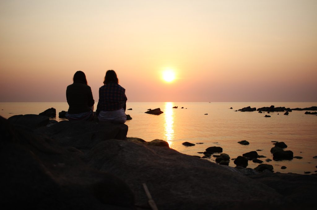 Watching the sunrise over Lake Malawi at the Lake of Stars festival