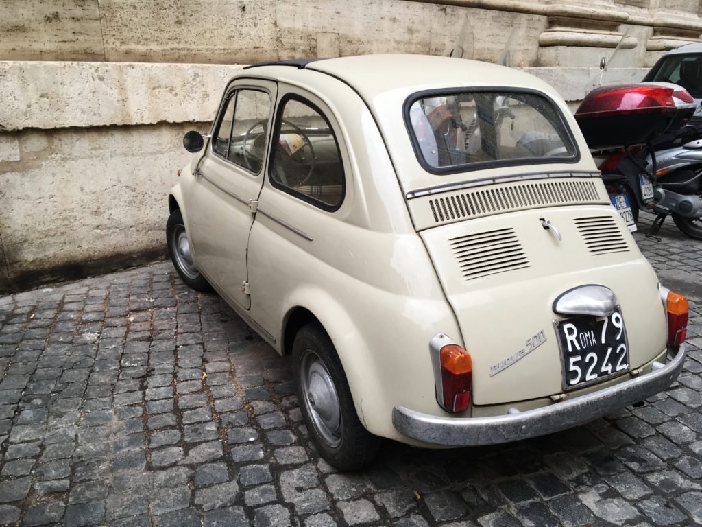 A tiny car on the streets of Rome, Italy