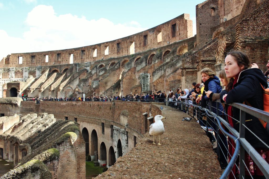 The crowd lining the interior of the Colosseum in Rome, Italy