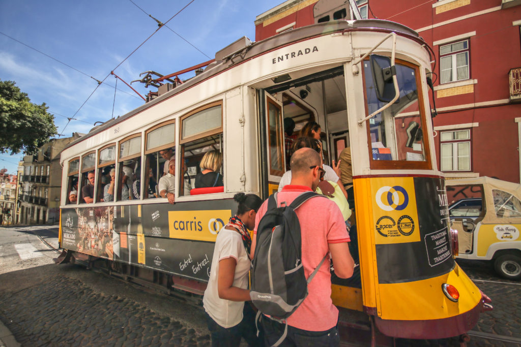 Taking the famous tram through Lisbon, Portugal