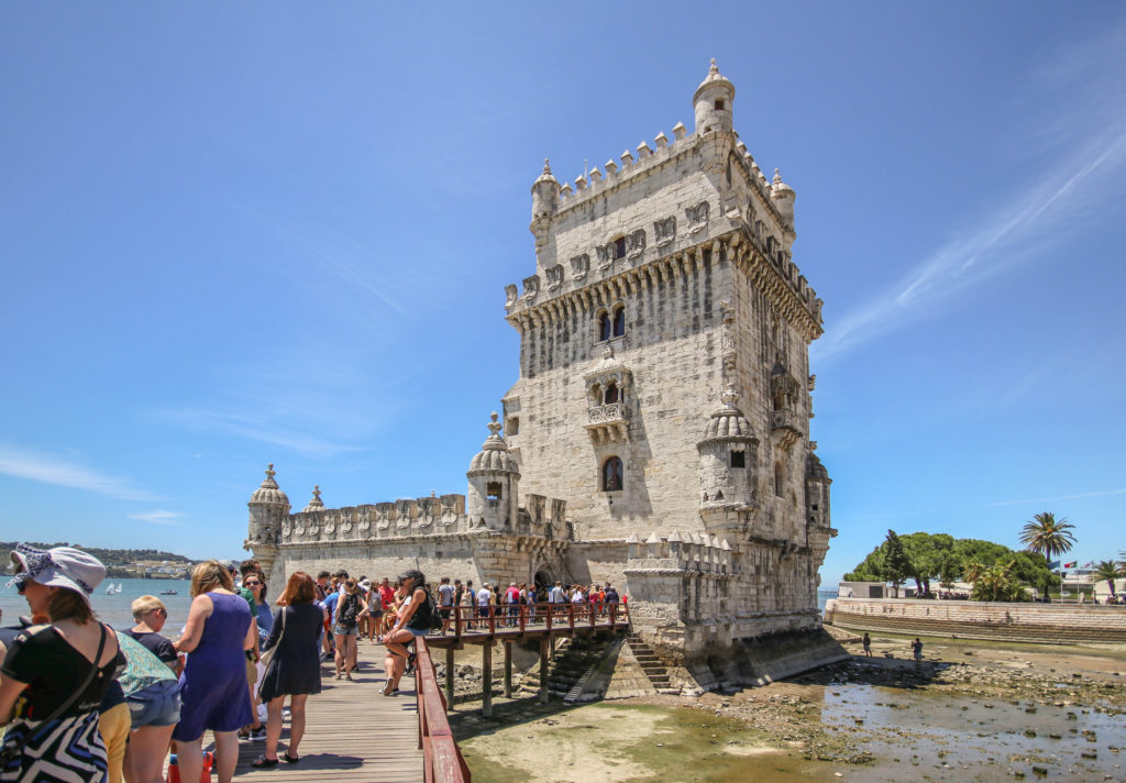 Crowds wait to enter the Belém Tower in Lisbon, Portugal
