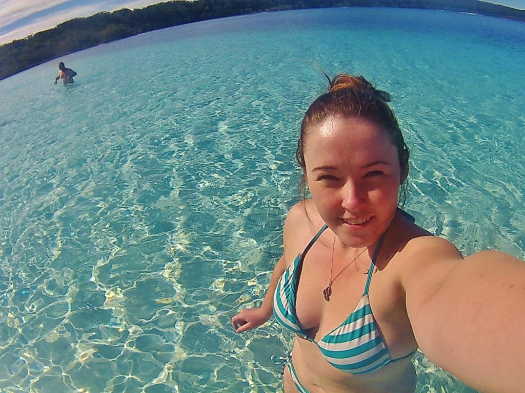 Taking a dip in the chilly but beautiful water of Lake McKenzie