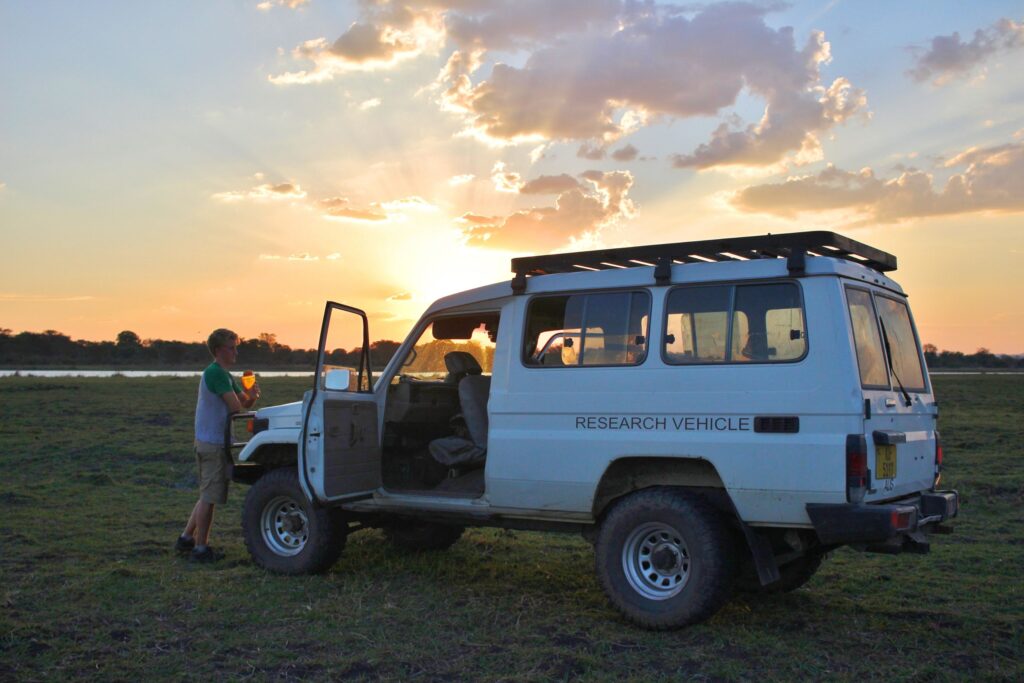 A research vehicle in front of a golden sunset