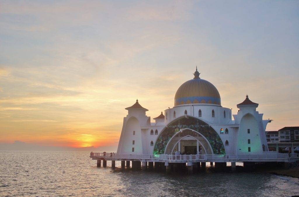 Melaka's floating mosque with the sun setting behind it, Malaysia