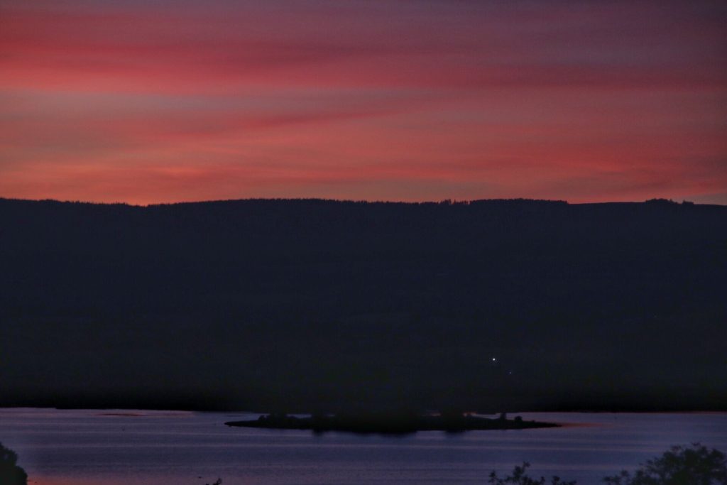 Red sky over the hills by Lough Derg, Ireland