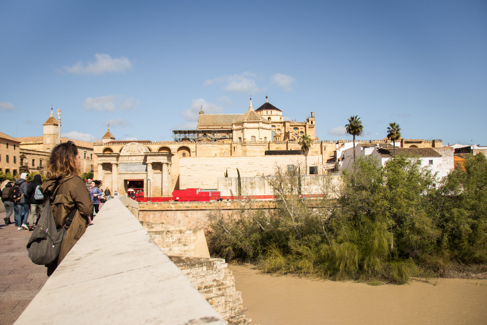 Taking in the view of the city from the Roman Bridge in Córdoba, Spain