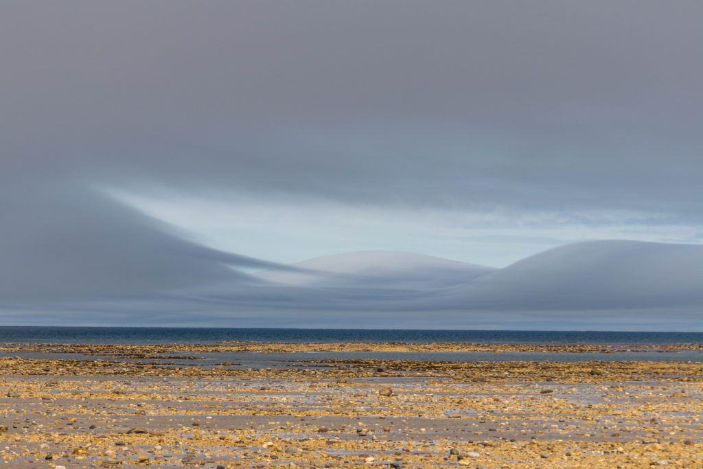 A break in the clouds over Hudson Bay, Canada, as seen on a tundra buggy tour with Frontiers North.