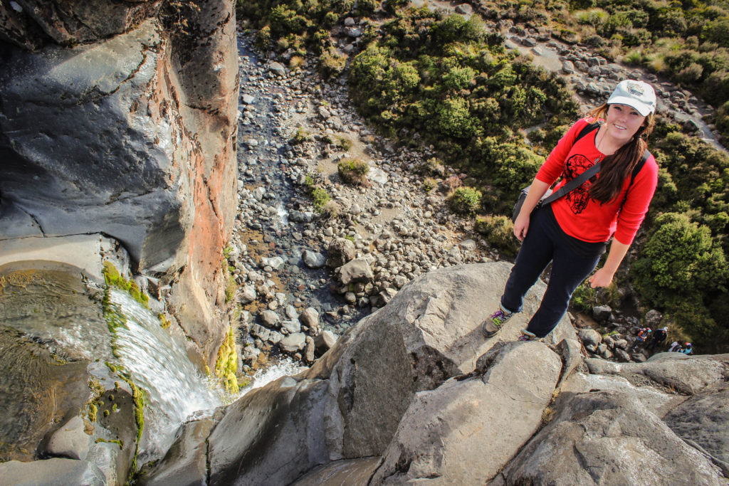 Standing at the top of the Taranaki Falls, New Zealand