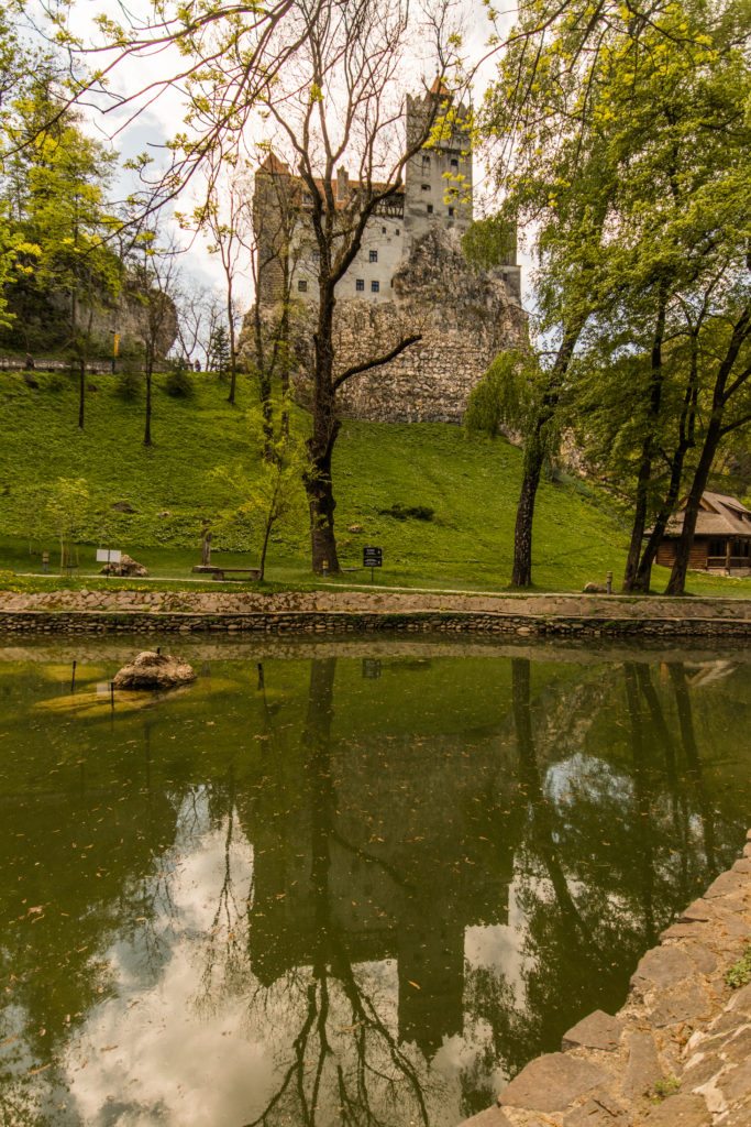 Reflection of Bran Castle, a popular stop on any Romania itinerary