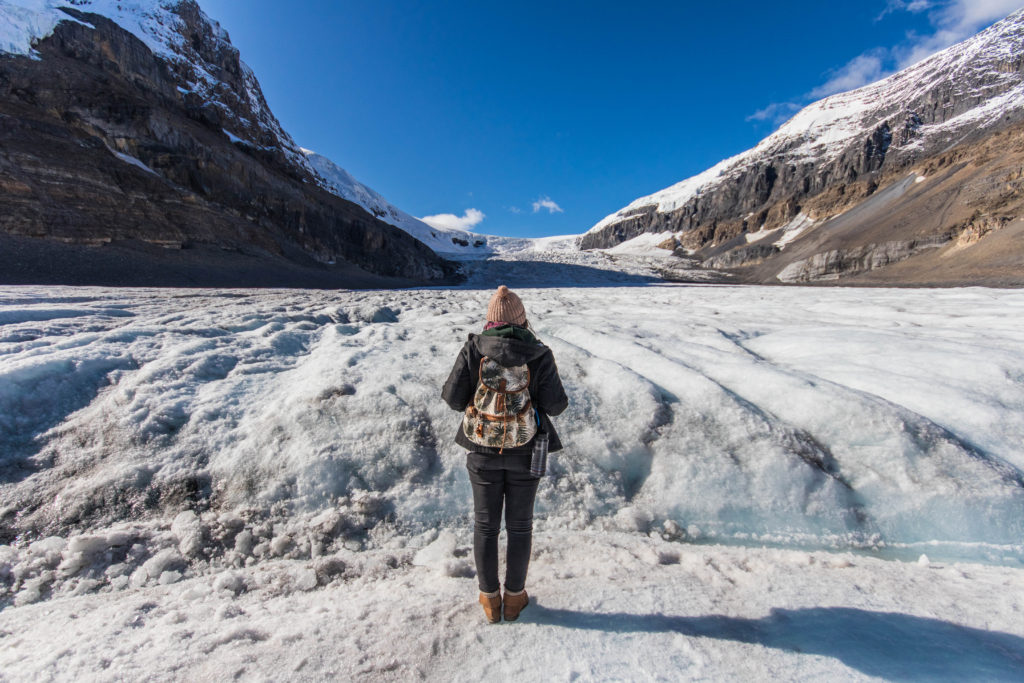 Standing on the Athabasca Glacier during a tour of the Columbia Icefield in Alberta, Canada