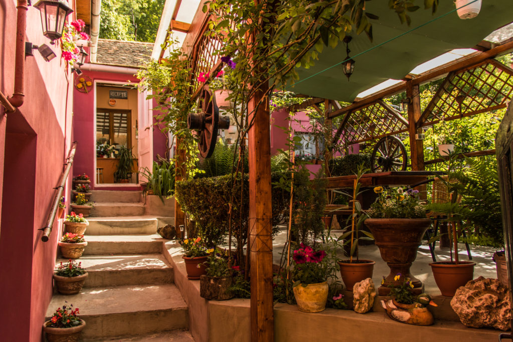 The pretty courtyard of Pensiunea Cristina si Pavel, where I stayed when I got to visit Sighisoara, Romania