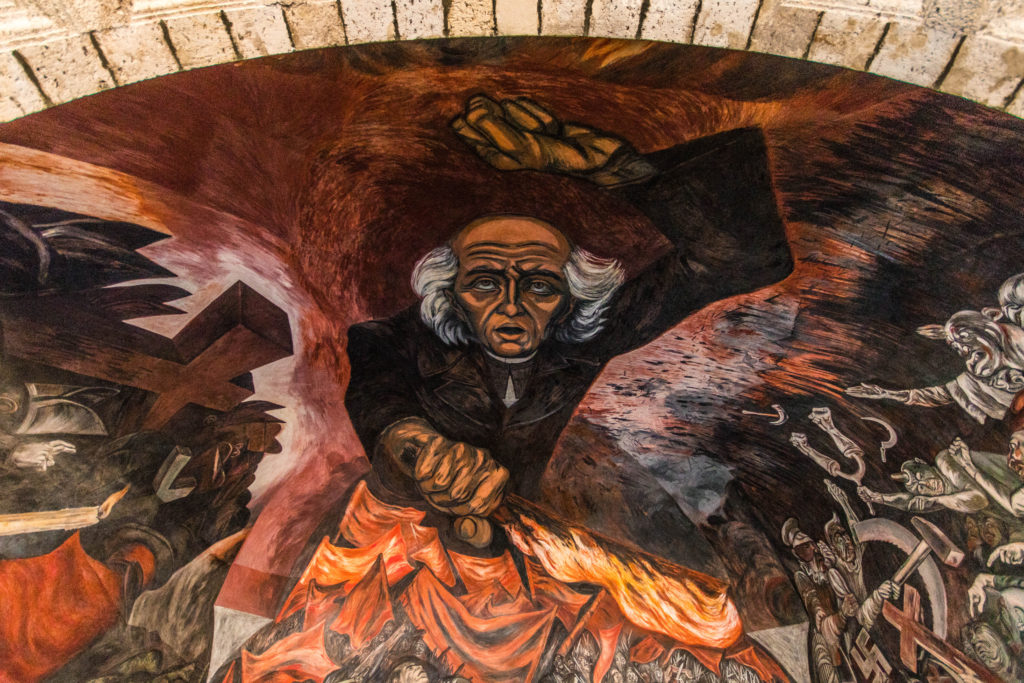 A large vivid mural in the Palacio Gobierno