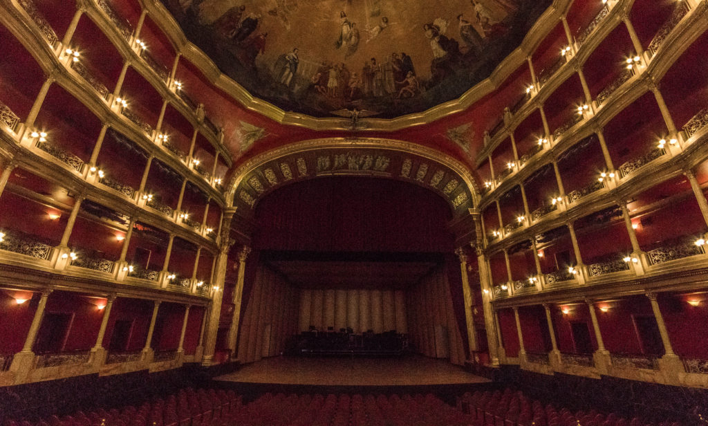 A red and gold interior of the Teatro Degollado