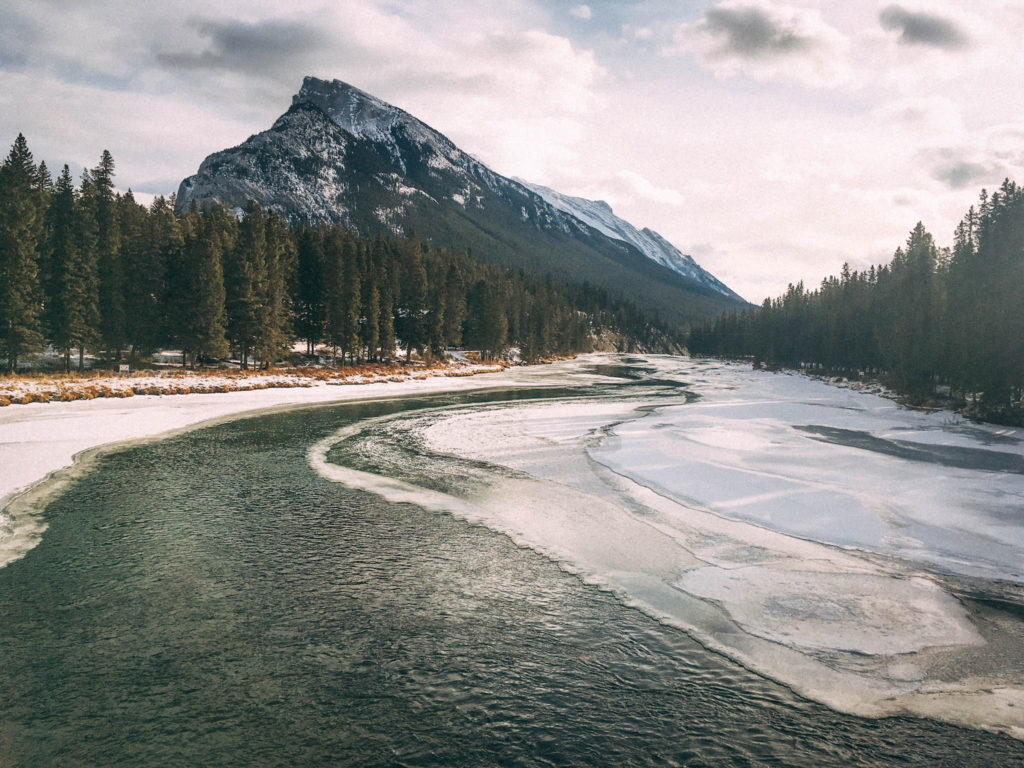 Crossing the icy river in Banff, Alberta
