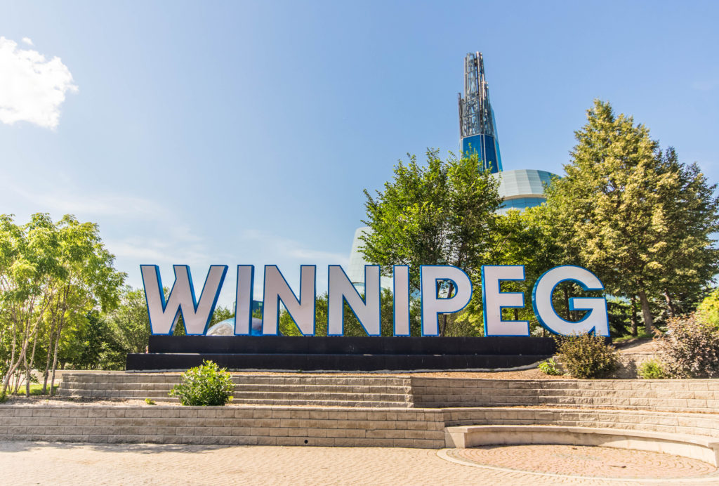 The Winnipeg sign in front of the Canadian Museum for Human Rights