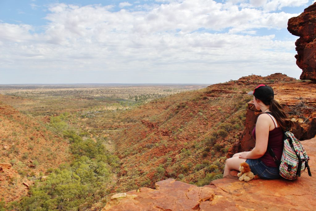 Sitting on the edge of the King's Canyon Rim, my favourite hike and one of my top experiences in Australia