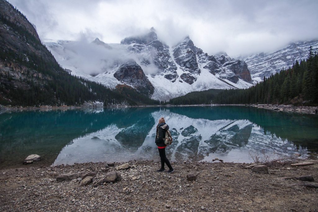 On the shore of Moraine Lake, one of the top Banff Bucket List attractions that should not be missed