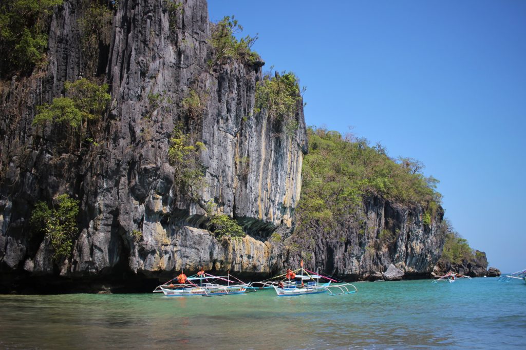Tall cliffs by the ocean near the Subterranean River, one of the top things to do during your three weeks in the Philippines