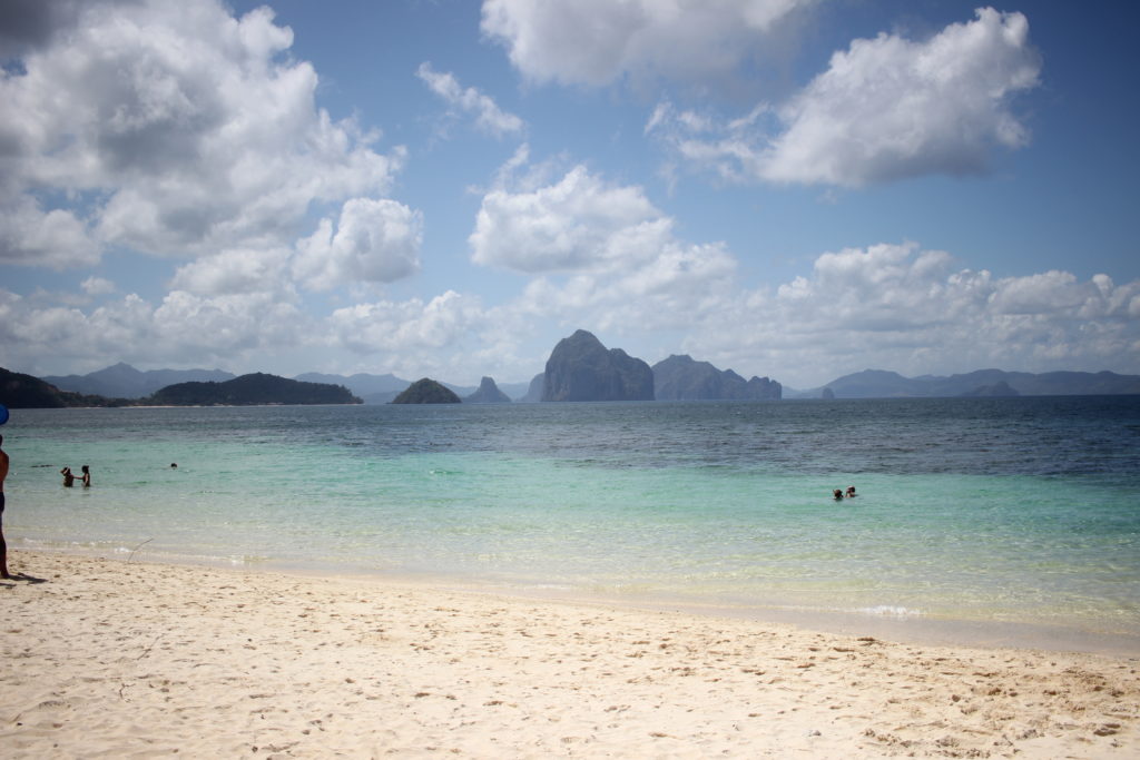 A beautiful white beach visited on an island hopping tour, one of the best things to do during three weeks in the Philippines