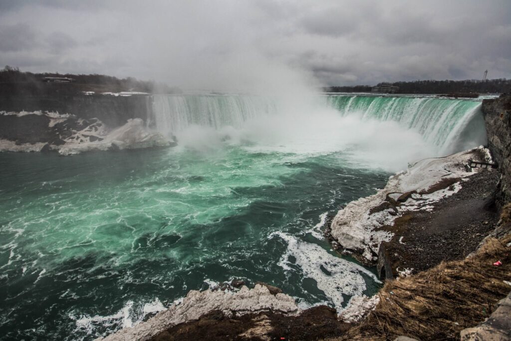 Niagara Falls in full flow on an overcast day