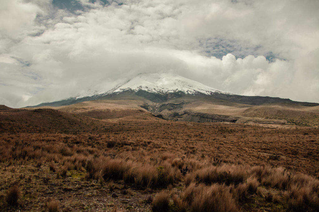 Clouds over the snow-capped peak of Cotopaxi, the second-highest peak in Ecuador