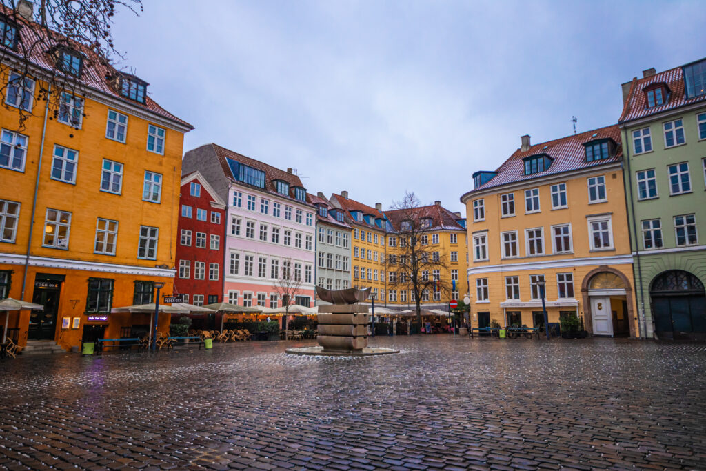 Colourful houses in a square, one of the best photo spots in Copenhagen