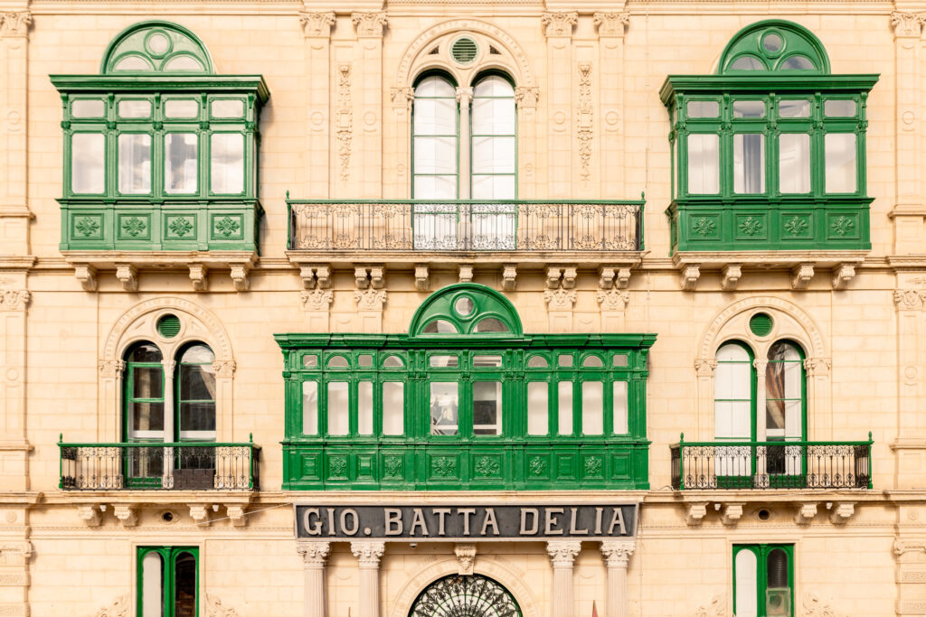 Close up of the Palazzo Ferreria in Valletta, with its green balconies, Malta