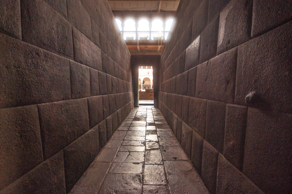 Incan stone walls inside Qorikancha, an important archaeological site in Cusco, Sacred Valley, Peru