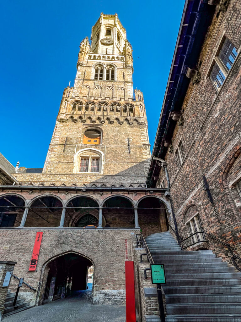 Looking up at the Belfry tower from its base