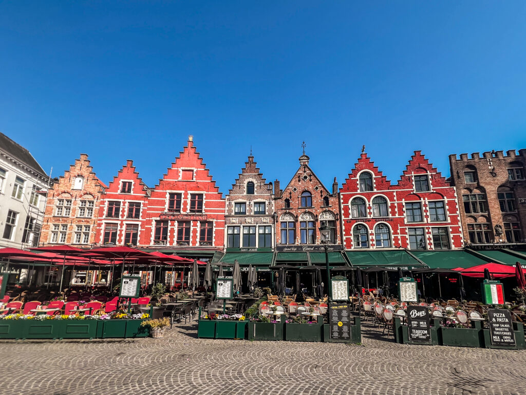 Colourful restaurant buildings in Market Square, Bruges