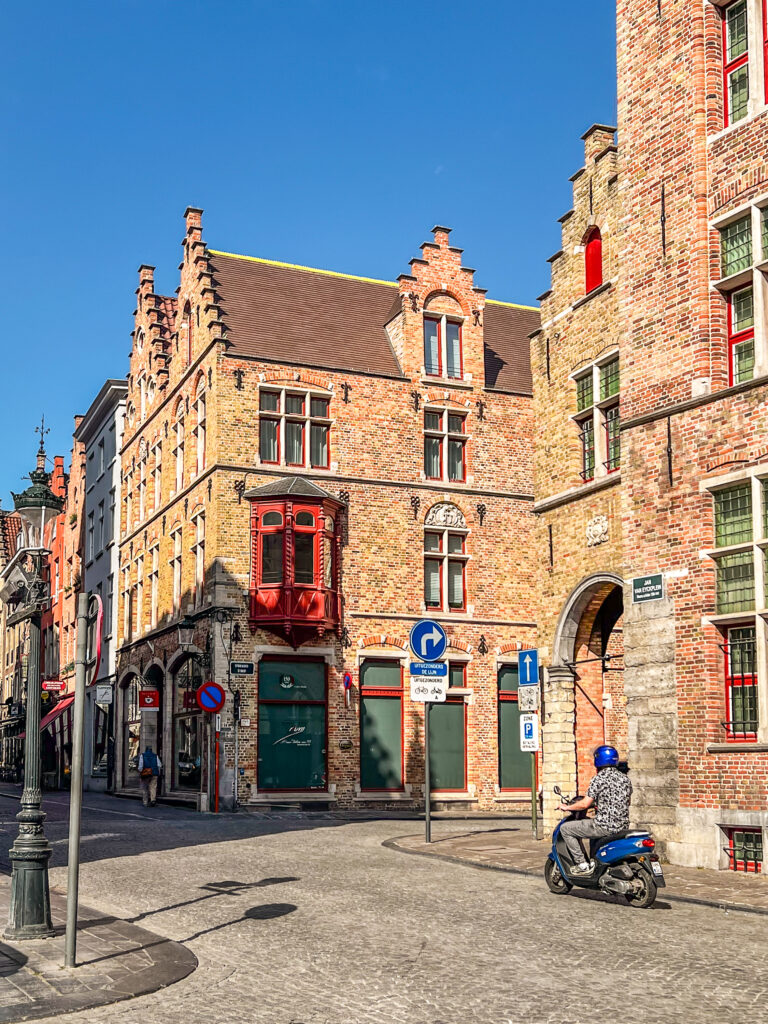 A motorcyclist on the streets of Bruges