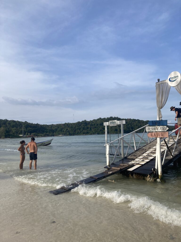 A plank leading from a boat onto the beach in Cambodia