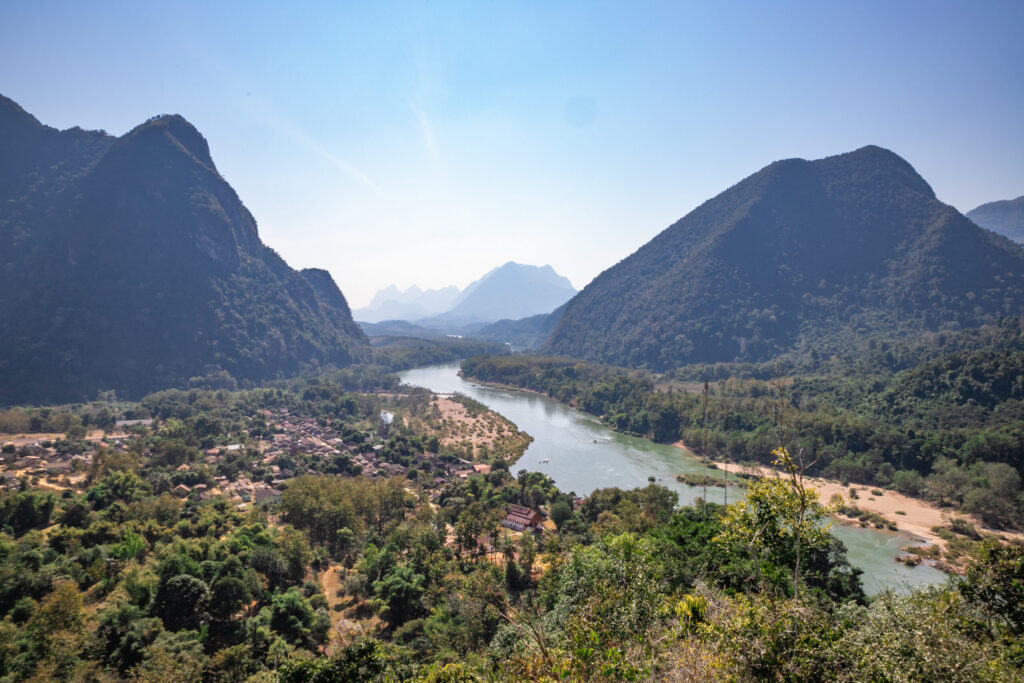 A view from above of a river running between mountains